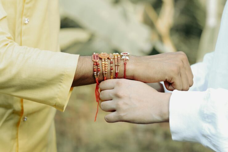 man and woman hands with bracelets