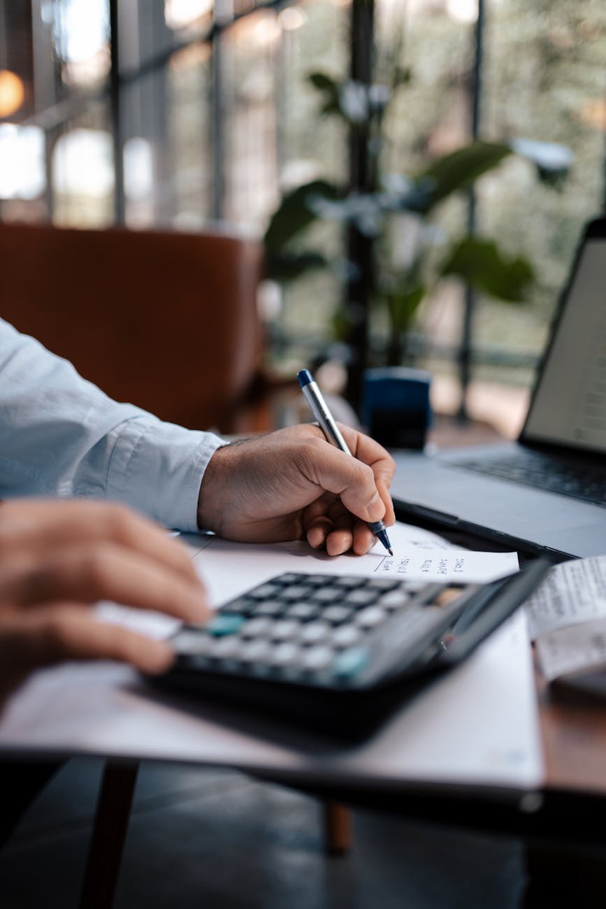 a person using a calculator